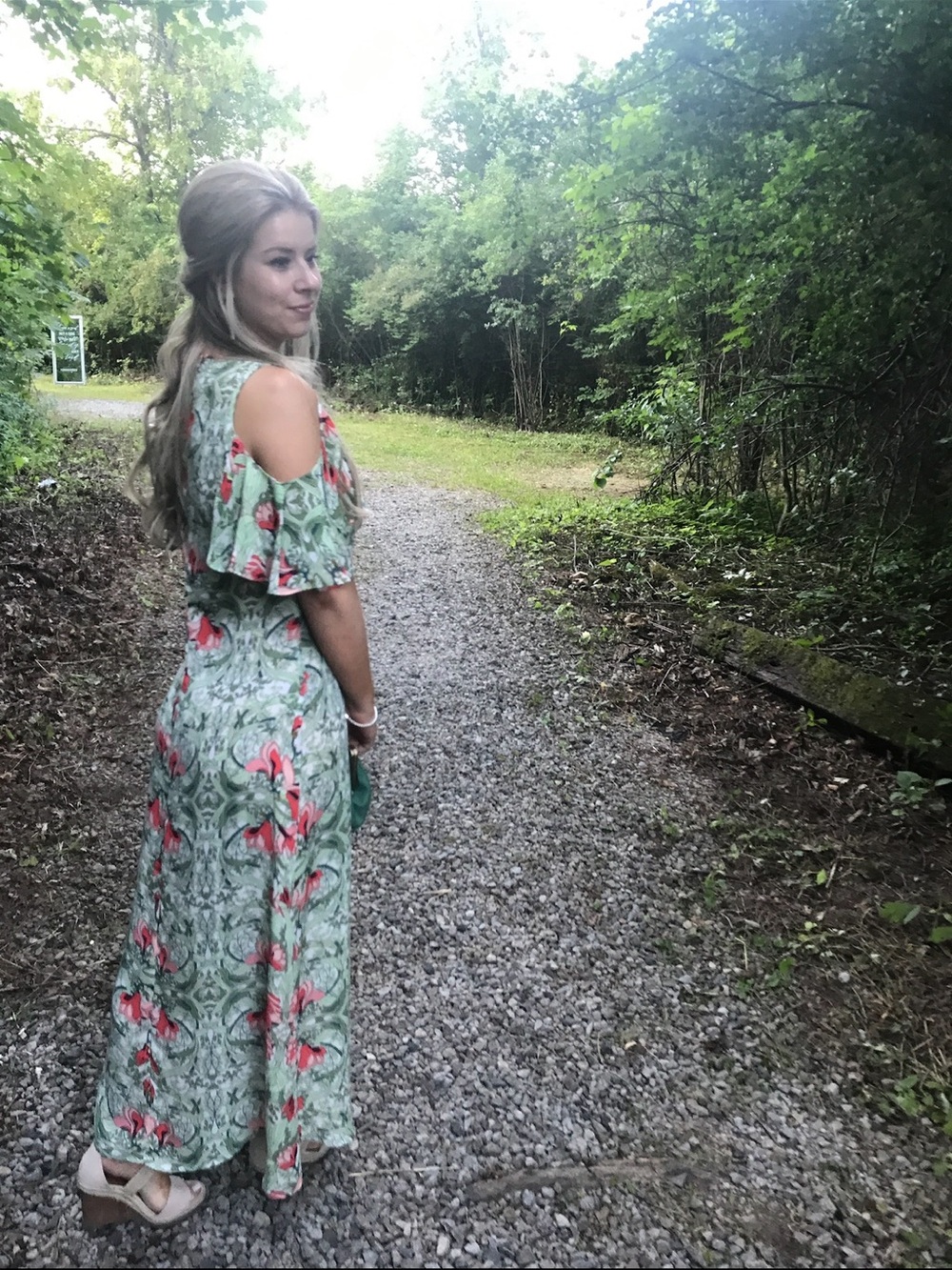 Light and airy maxi dress in a bold floral print with pretty ruffle sleeves